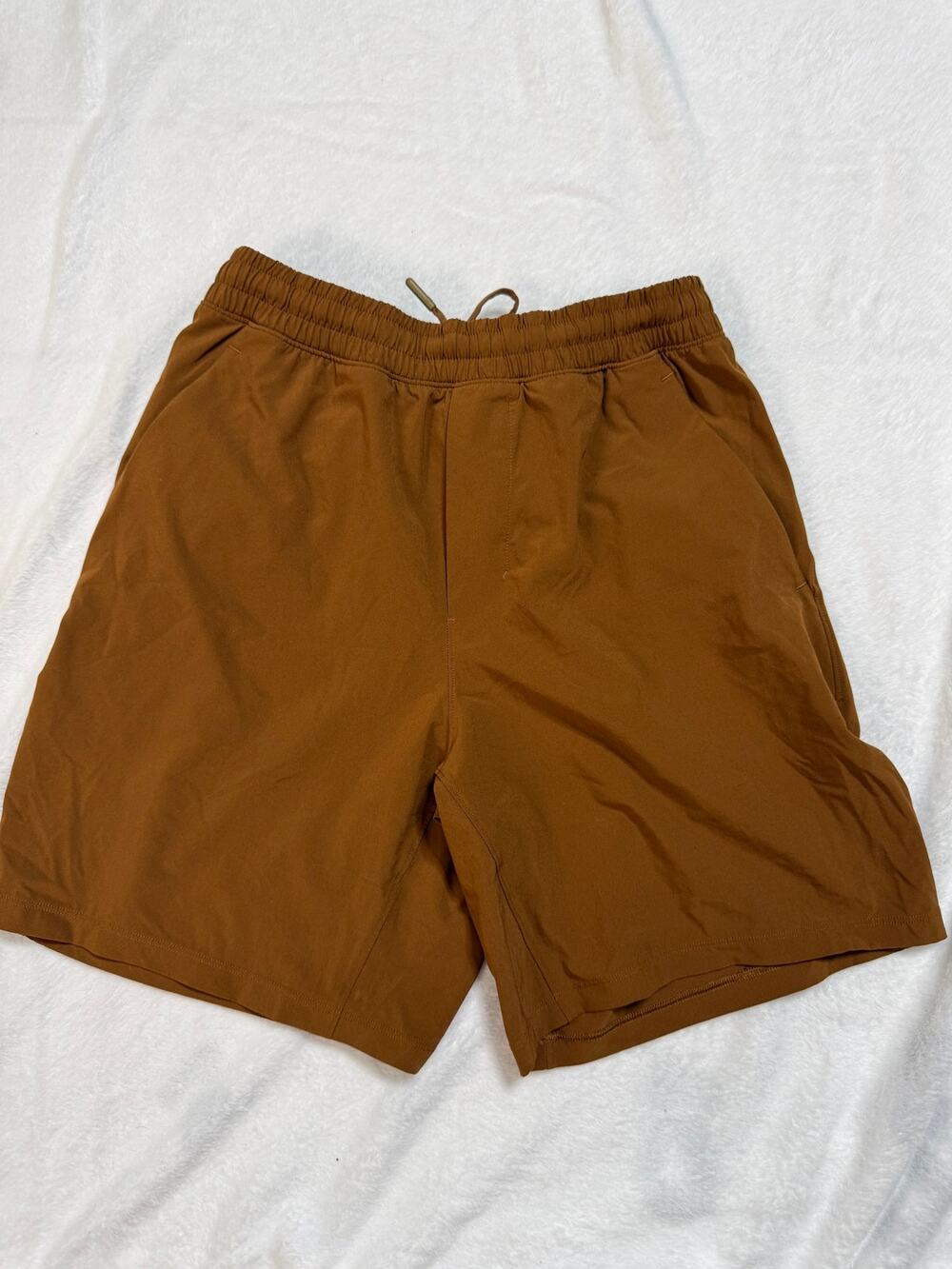 lululemon Pace Breaker Linerless 7” Shorts Men’s Small Copper Brown Running